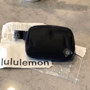 lululemon athletica Black Belt Bag, “Wordmark strap”